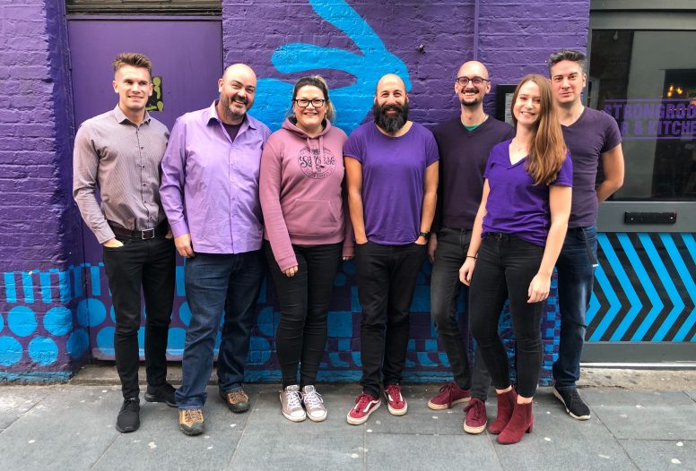 Fat Beehive team wearing purple to support Purple Tuesday