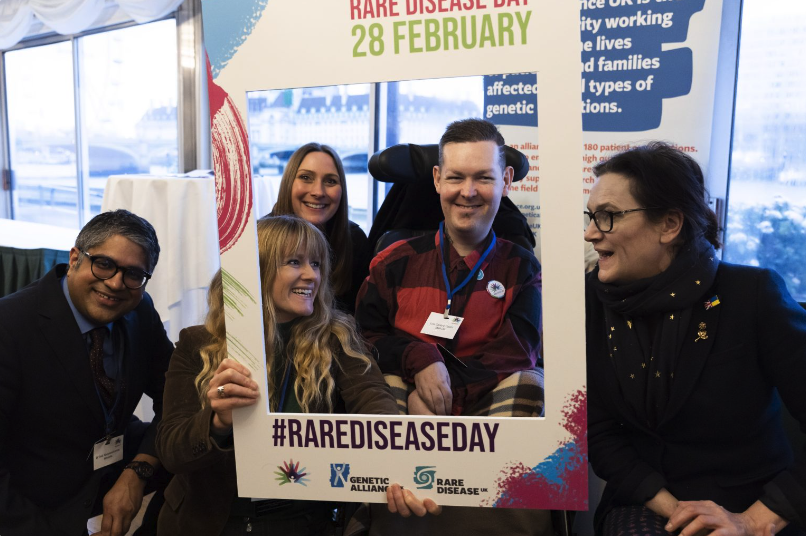 Campaigners for #RareDiseaseDay pose for a photo